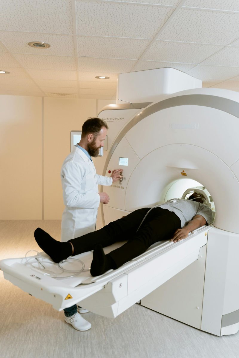 MRI Scan - Body Composition - Photo by MART PRODUCTION: https://www.pexels.com/photo/photo-of-doctor-doing-a-test-on-his-patient-7089392/ 